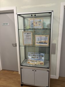 Display case with some printed information inside.